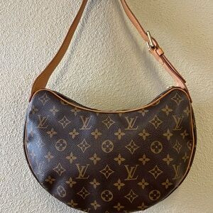 LOUIS VUITTON CROISSANT. Excellent condition and includes original dust bag.